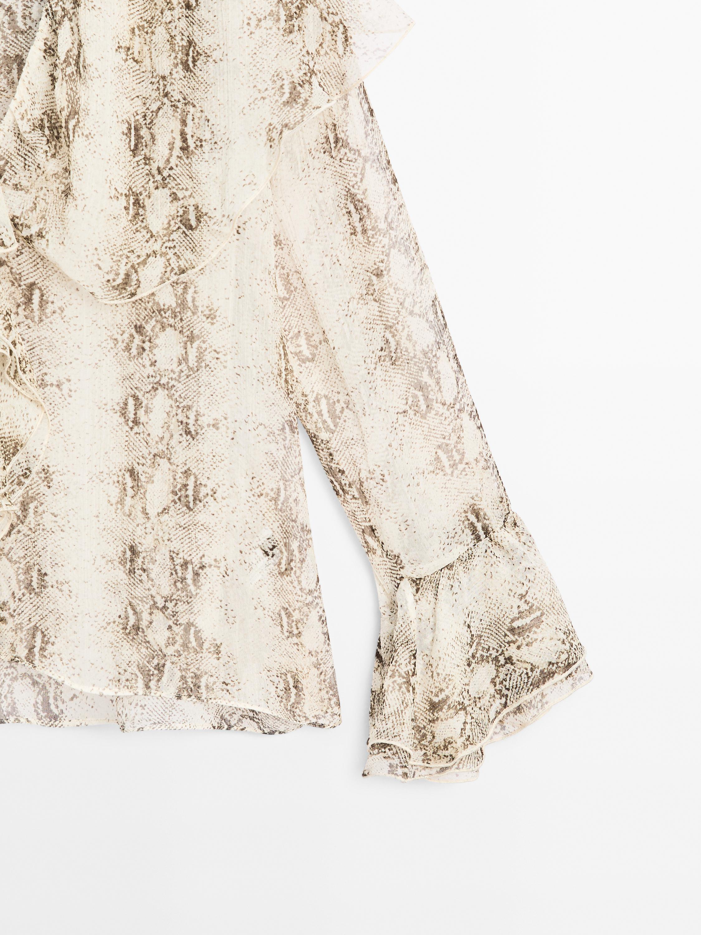 Snakeskin print blouse with ruffles